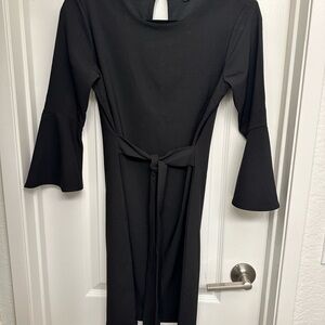 Elegant Black Dress with Flared Sleeves